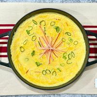 可能是‎粥、豆腐和‎顯示的文字是「 ‎ن W হ৫ ወጋ1 ወሳ staub® enfranc‎ 」‎‎ 的圖像