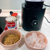 可能是粥和顯示的文字是「 100 富 arnation ผลิตภัณฑ์ม ผลิตภัณห์น S pebu ያ 成」的圖像