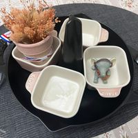 可能是大象和顯示的文字是「 stauk TAUO A そ STAUB STAUE SURTS modern-tujst modern-twist 」的圖像