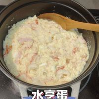 可能是粥、豆腐和顯示的文字是「 SIAUB 水烹蛋 vivo X70 Pro+ VVXIIES ZEISS 2025/05/12 18:44 」的圖像