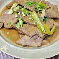 可能是燉小牛膝和文字的圖像