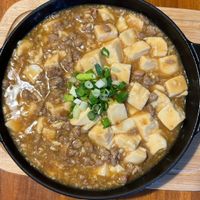 可能是拉麵、豆腐、粥和文字的圖像