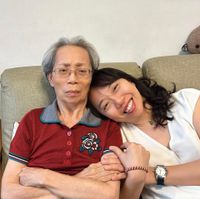 可能是 2 個人和微笑的人的圖像