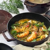 可能是西班牙大鍋飯和文字的圖像