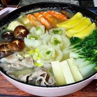 可能是豆腐、火鍋、拉麵、起司火鍋和文字的圖像