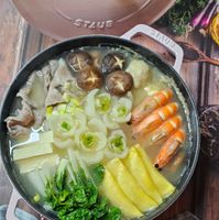 可能是火鍋、豆腐和文字的圖像