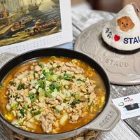 可能是火鍋、豆腐和文字的圖像