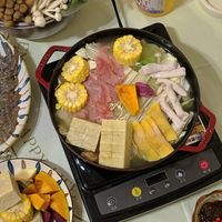 可能是火鍋、豆腐和文字的圖像