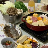 可能是起司火鍋、火鍋、豆腐和文字的圖像