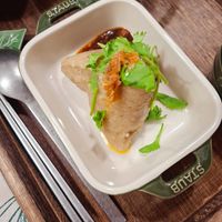 可能是火鍋、豆腐、粥和燉小牛膝的圖像
