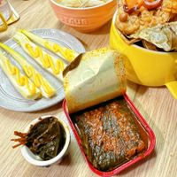 可能是粥、豆腐、鯷魚和文字的圖像