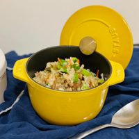 可能是西班牙大鍋飯、牧羊人派、北非小米飯、炒飯和文字的圖像