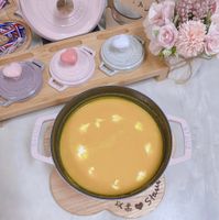 可能是起司火鍋、豆腐和文字的圖像