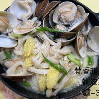 可能是顯示的文字是「蒜香超士蛤 蒜香 蛤 菜 -32 」的圖像