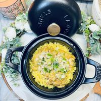可能是炒飯、印度香料飯、西班牙大鍋飯、牧羊人派和文字的圖像