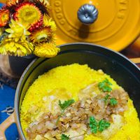 可能是北非小米飯、粥、西班牙大鍋飯和印度香料飯的圖像