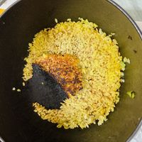 可能是印度香料飯、炒飯和北非小米飯的圖像