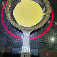 可能是木湯匙、起司火鍋和鬆餅機的圖像