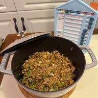 可能是炒飯、印度香料飯和文字的圖像