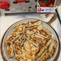 可能是肉餡餅和文字的圖像