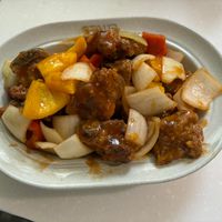可能是快炒和肉排的圖像