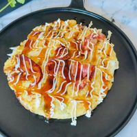 可能是歐姆蛋和顯示的文字是「 STAUB 」的圖像