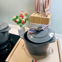 可能是泡茶器和文字的圖像