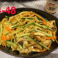 可能是炒麵、豆腐和文字的圖像