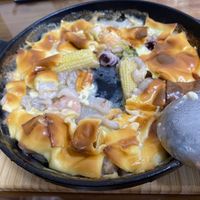 可能是火鍋、豆腐和拉麵的圖像