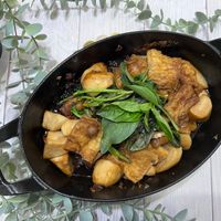 可能是豆腐、香菇和燉小牛膝的圖像
