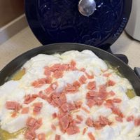 May be an image of omelet and poached egg