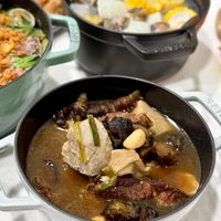 可能是火鍋、豆腐和香菇的圖像