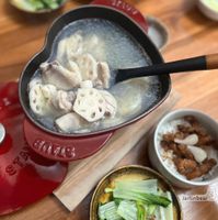 可能是火鍋、粥、豆腐和文字的圖像