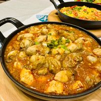 可能是火鍋、西班牙大鍋飯和豆腐的圖像