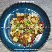 可能是豆腐和豆煮玉米的圖像