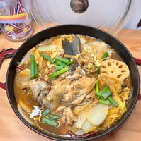 可能是豆腐、火鍋、拉麵和文字的圖像