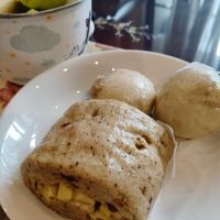 可能是墨西哥捲餅、豆腐和文字的圖像