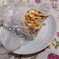 可能是豆腐、希臘旋轉烤肉和墨西哥捲餅的圖像