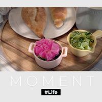 可能是顯示的文字是「 MOMENT ENT M O #Life 」的圖像