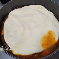 可能是牧羊人派、豆腐和水波蛋的圖像