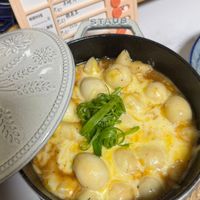 可能是火鍋、豆腐和文字的圖像