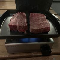 可能是肉排和文字的圖像