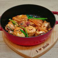 可能是火鍋、豆腐和文字的圖像
