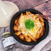 可能是義大利麵、豆腐和文字的圖像