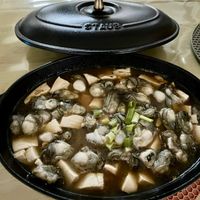 可能是火鍋、香菇、豆腐、粥和文字的圖像