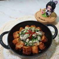 可能是豆腐、炸丸子和顯示的文字是「 10 Staub Staub 」的圖像