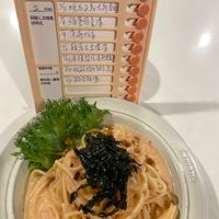 可能是魚卵、義大利麵和文字的圖像