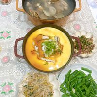 可能是火鍋、粥、豆腐、麵、拉麵和文字的圖像