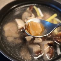 可能是火鍋、粥、拉麵、豆腐和香菇的圖像