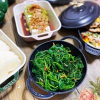 可能是火鍋、豆腐、紫蘇和文字的圖像